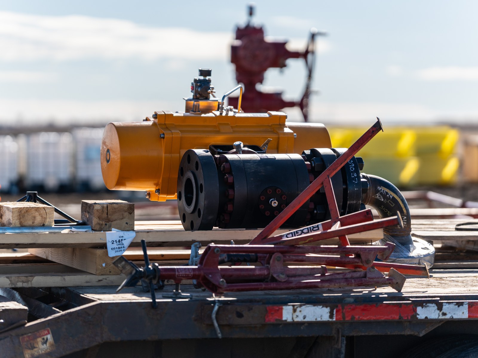 An actuated valve assembly staged on a flatbed trailer at the E3 Lithium site