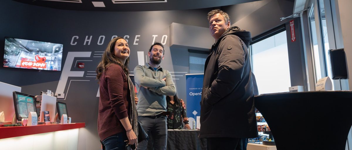 3 CCA Connect attendees watching the wind tunnel, iFLY Calgary