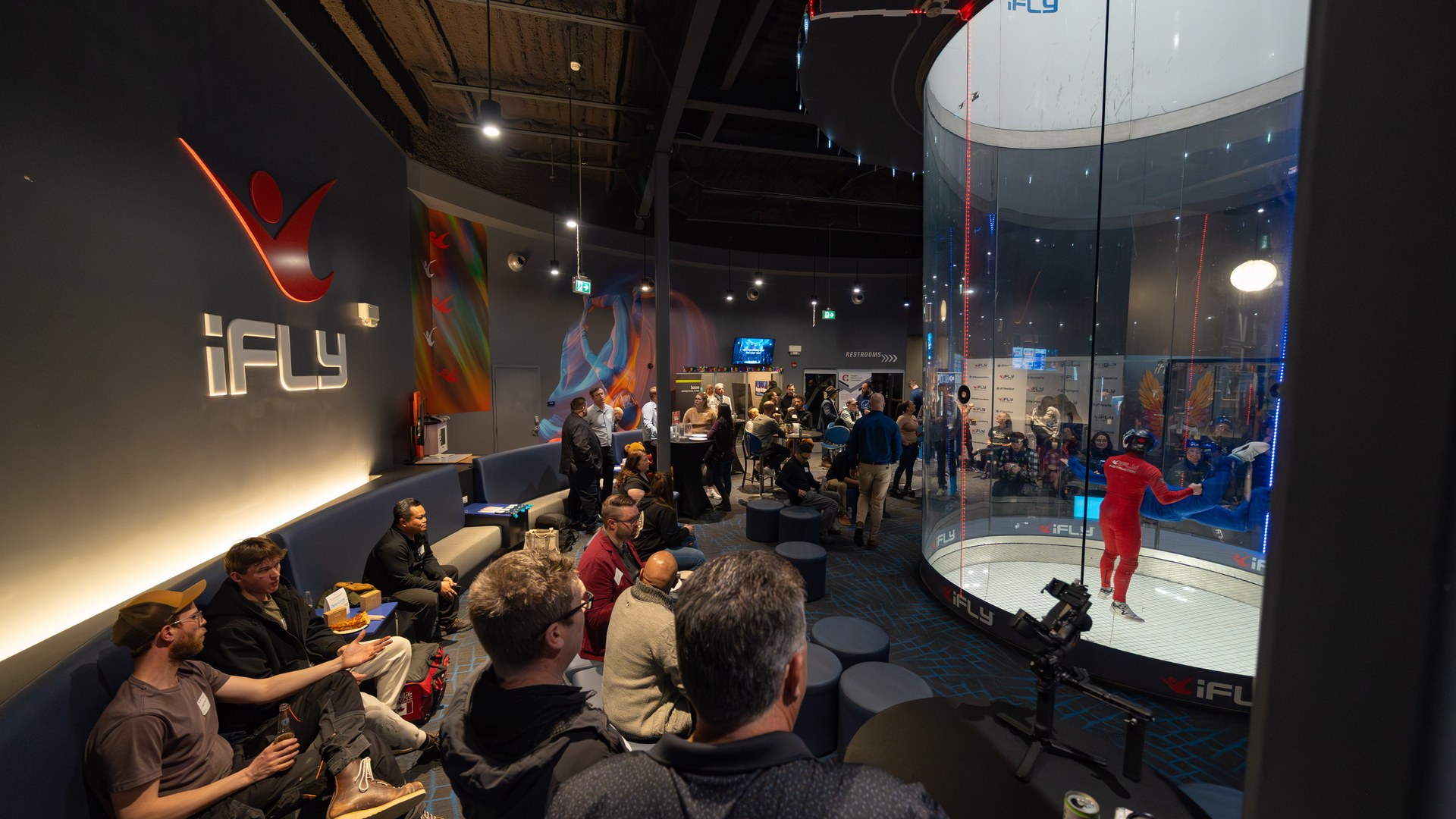CCA Connect attendees watching a flyer in the iFLY wind tunnel, Calgary