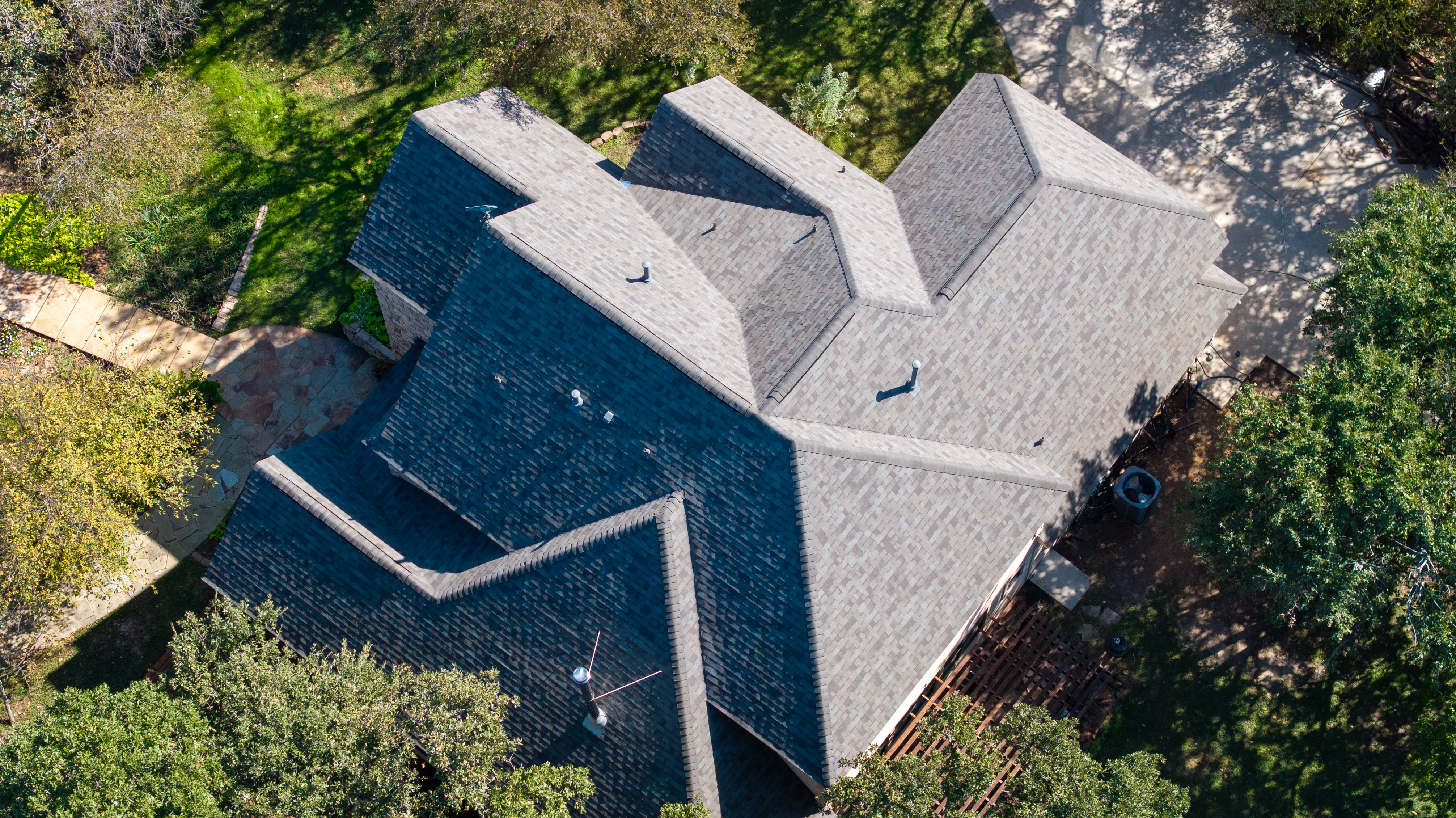 New asphalt shingles installed on large residential home.
