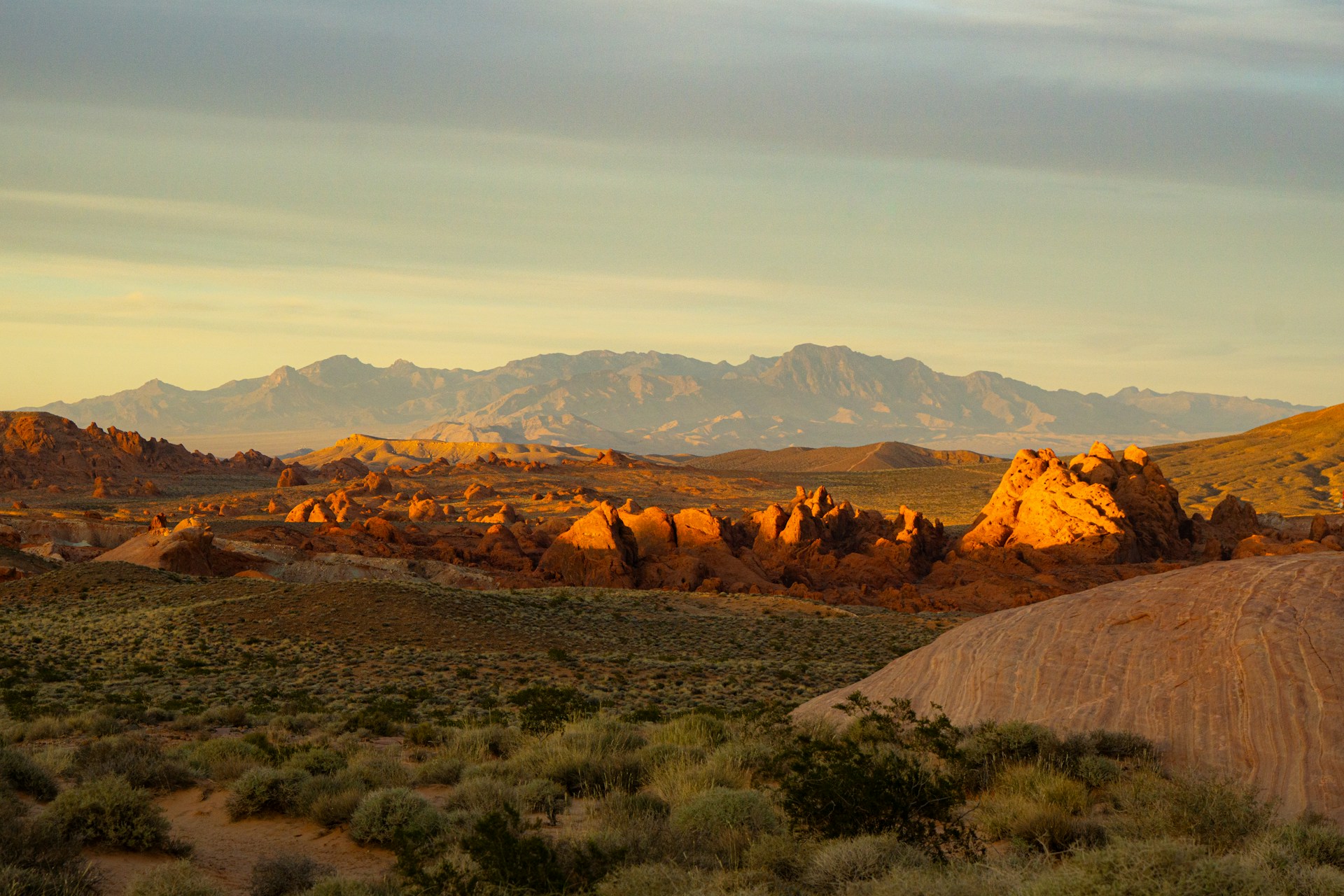 Desert rock formations and mountains in the Nevada landscape