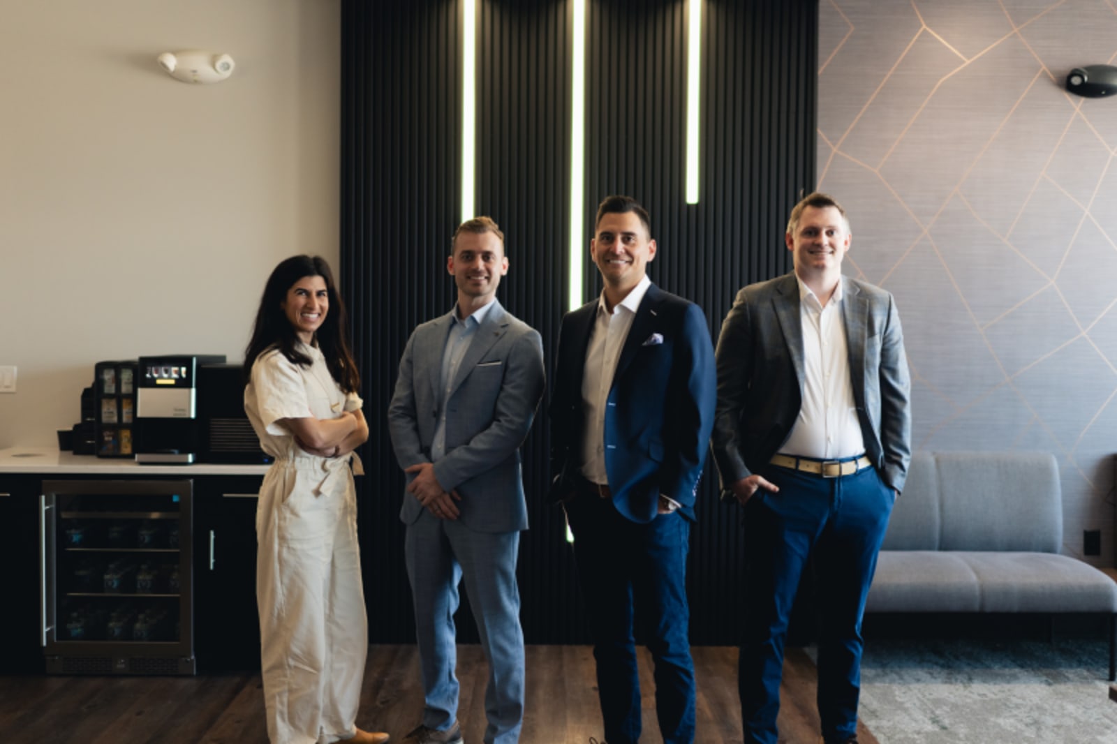 Elmbrook Family Dental team members standing together in modern office