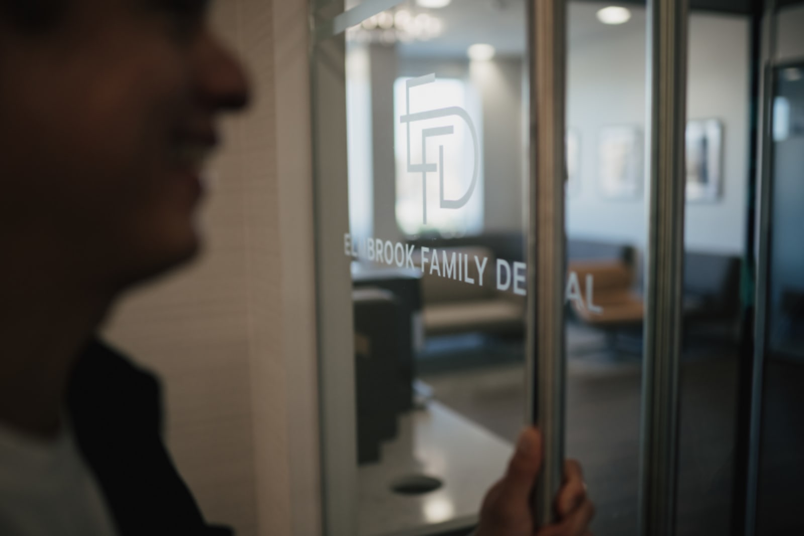 Patient receiving dental treatment in a modern dental operatory at Elmbrook Family Dental.