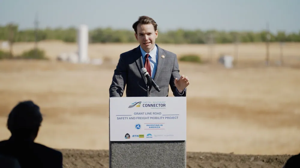Representative Kevin Kiley speaks at the Grant Line Road Safety and Freight Mobility Project podium