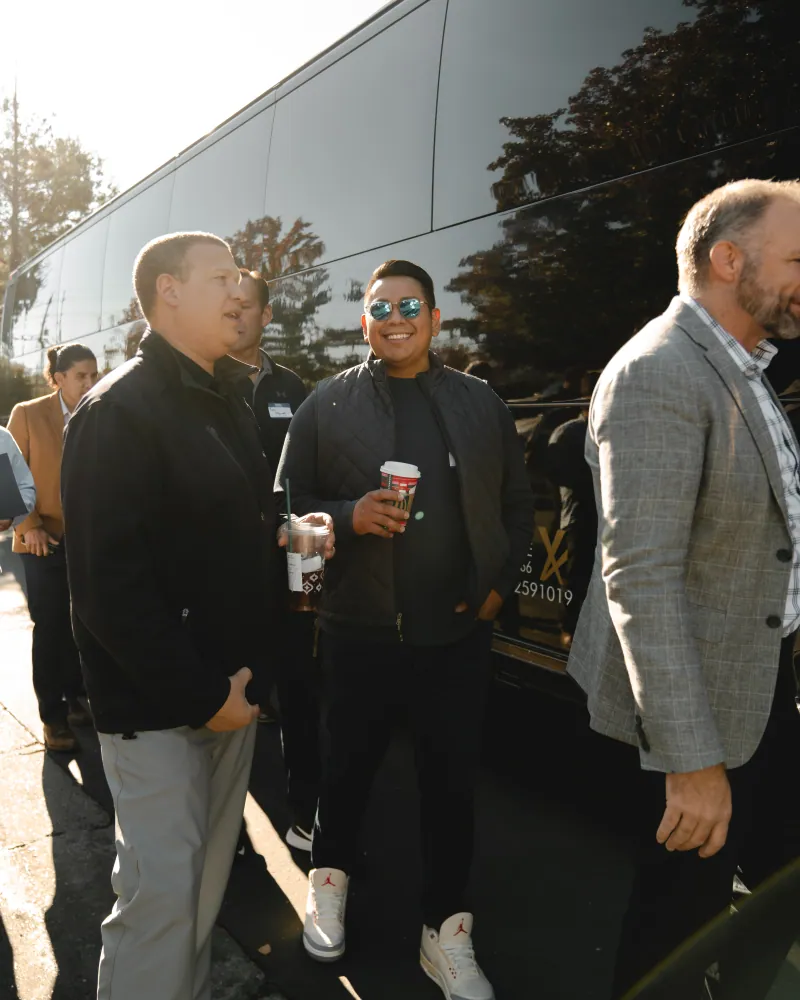 Corridor Tour Attendees Boarding Bus
