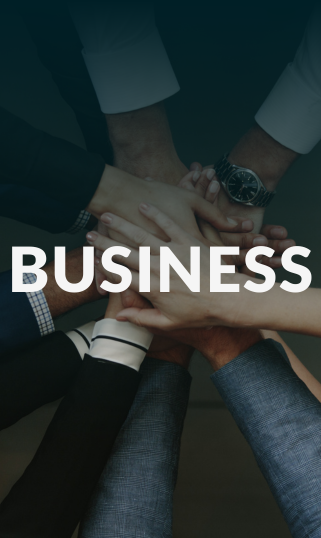 Multiple business professionals joining hands in a teamwork gesture with the word BUSINESS overlaid.