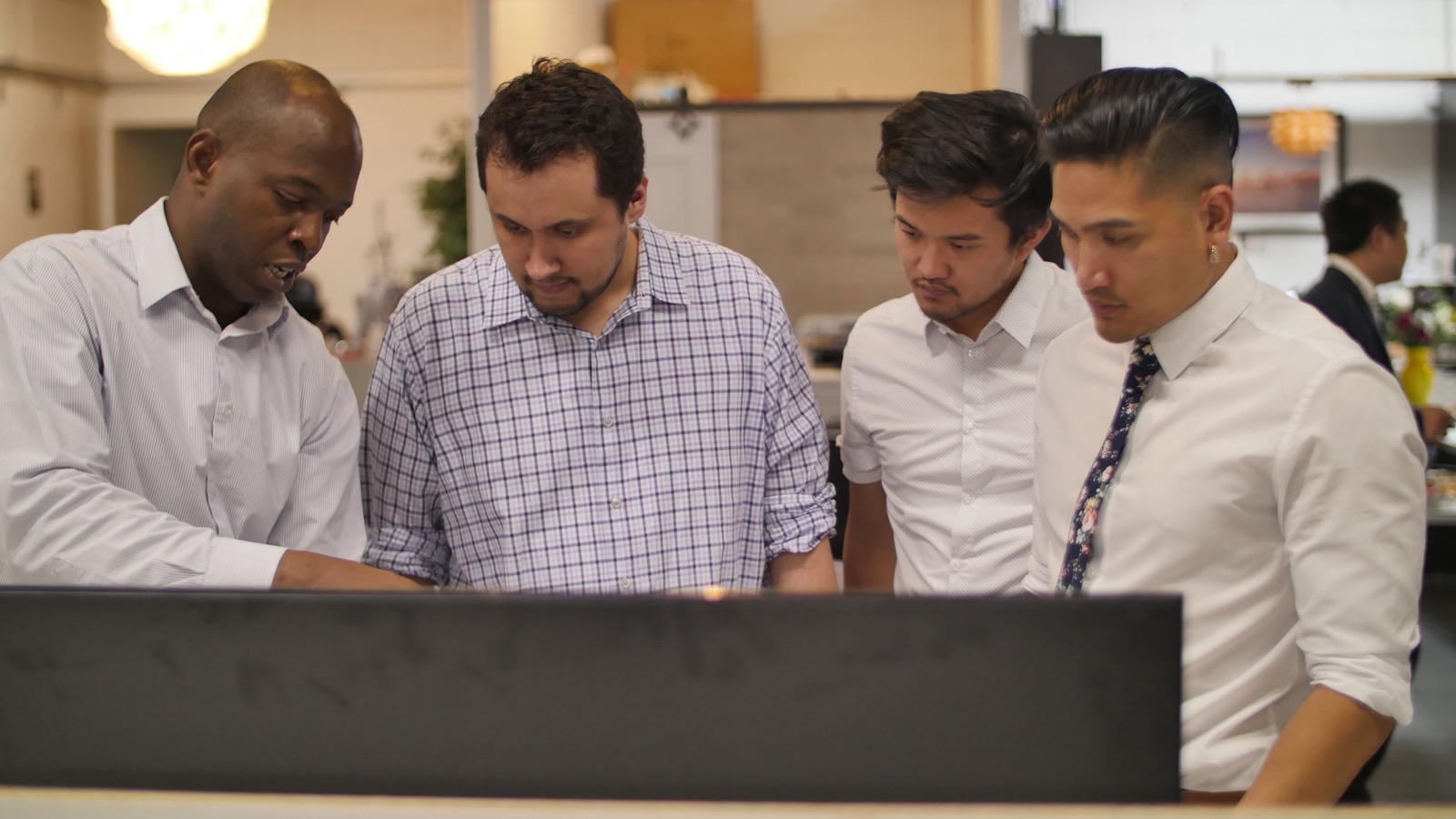 Marlo Custodio advising founders at a San José tech incubator