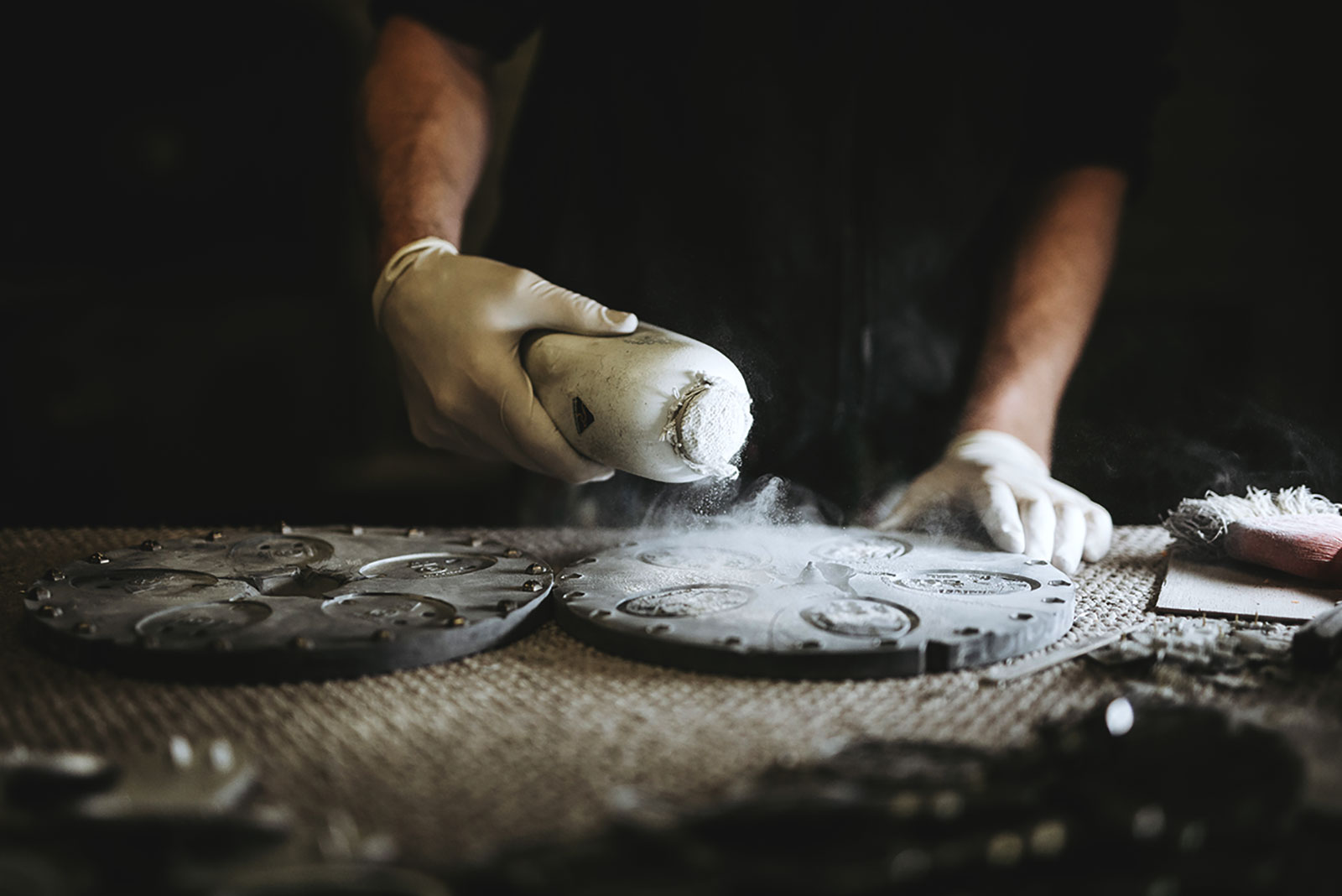 Preparing rubber moulds for pewter casting before production begins