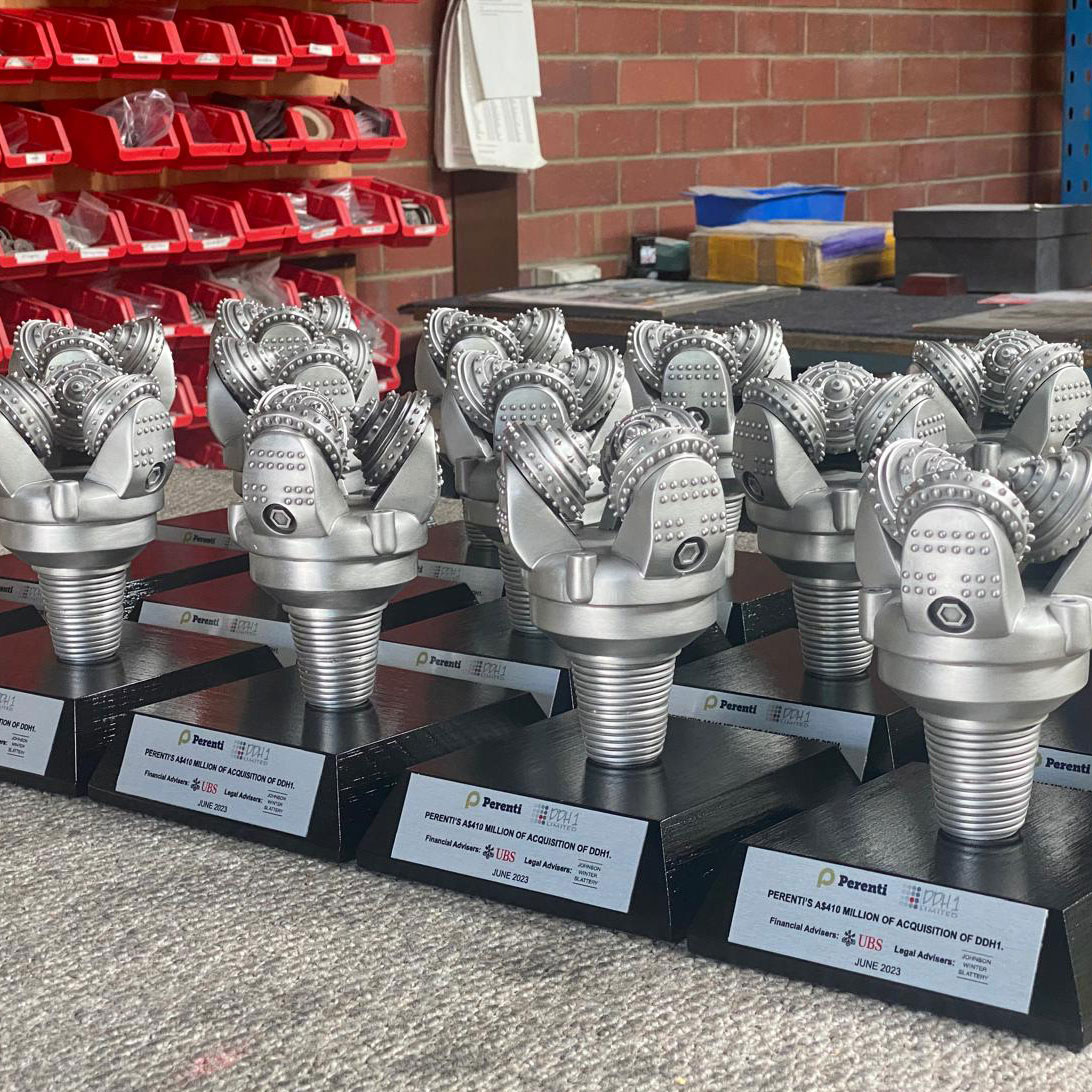 Production run of custom Perenti recognition awards modelled on a mining drill bit.