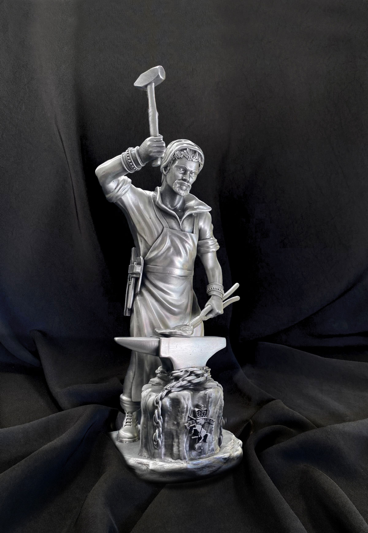 Custom Saint Eligius pewter sculpture mounted on timber base, manufactured by Buckingham Pewter in Western Australia