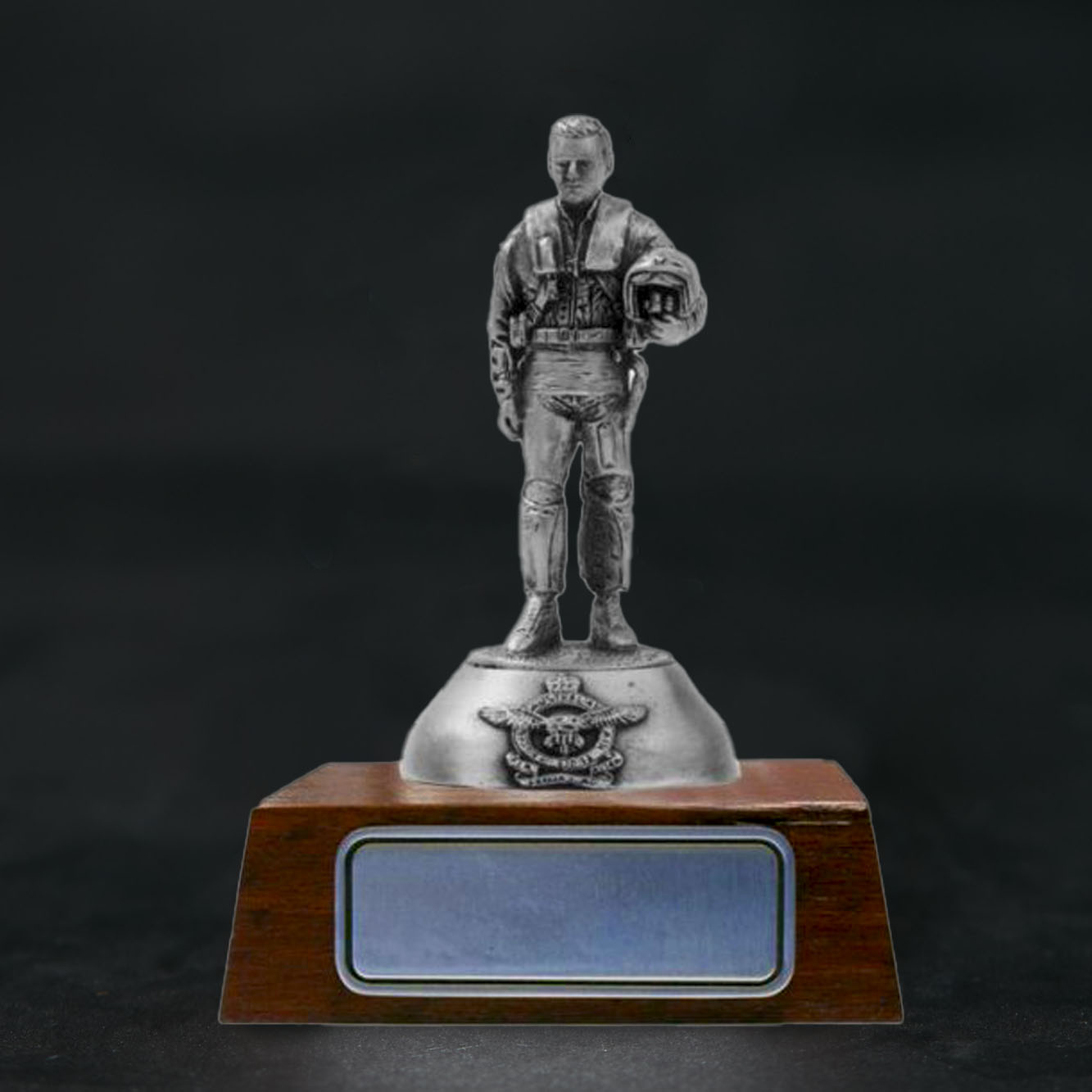 Custom military aviation award featuring a pewter aircrew figurine mounted on a timber base.