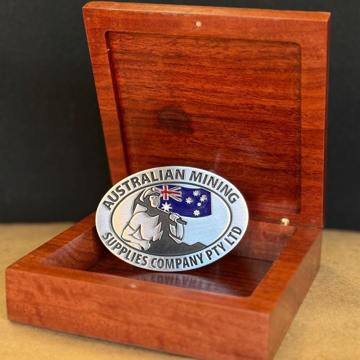 Custom pewter medallion for Australian Mining Supplies Company presented in a handcrafted timber display box.