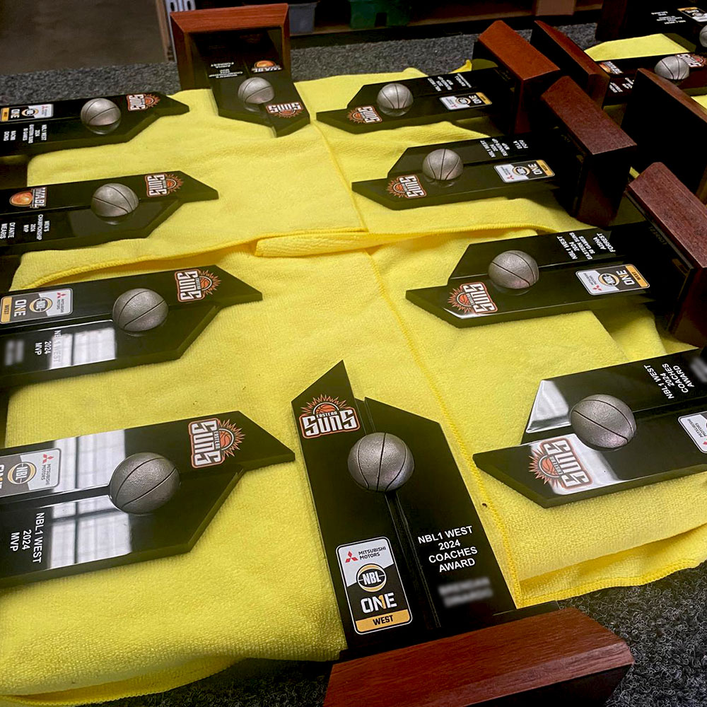 Presentation awards assembled from multiple custom-manufactured components ready for delivery