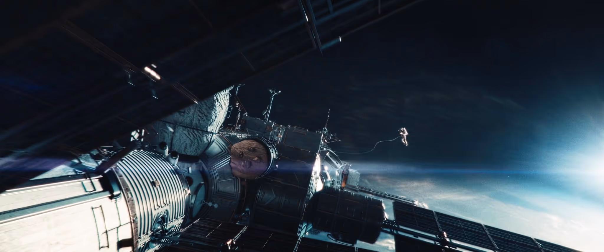 astronaut floating outside spaceship 
