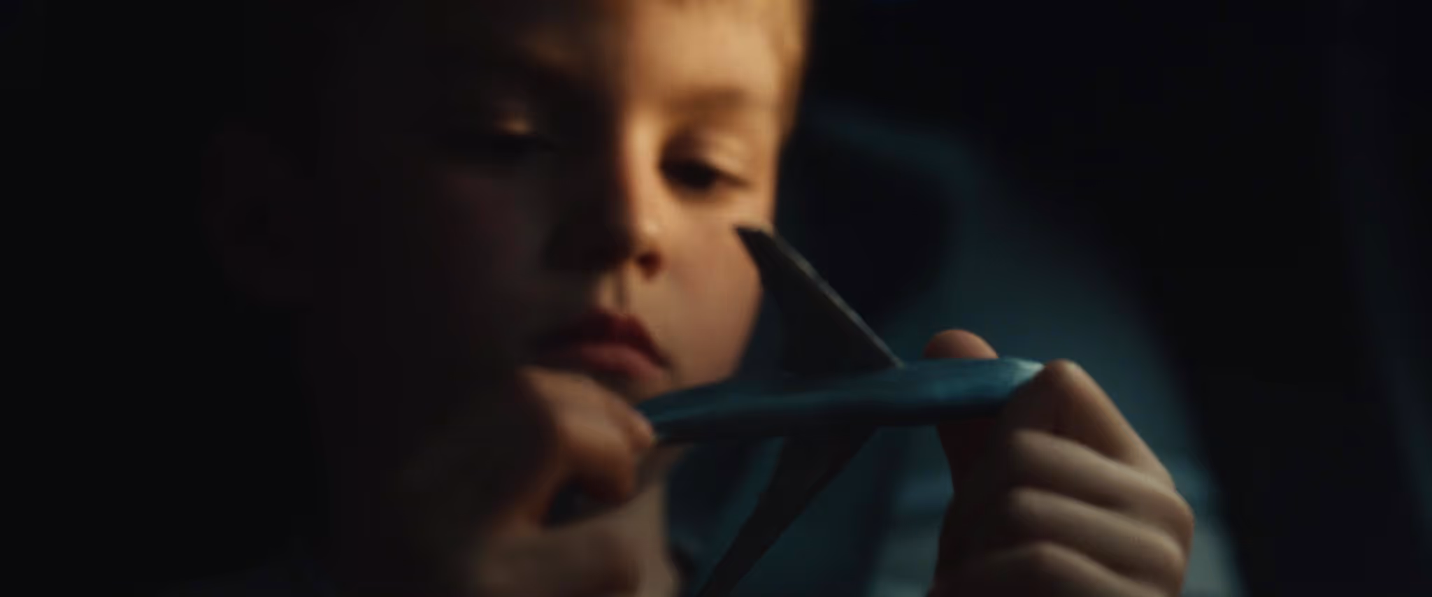 child playing with spaceship toy