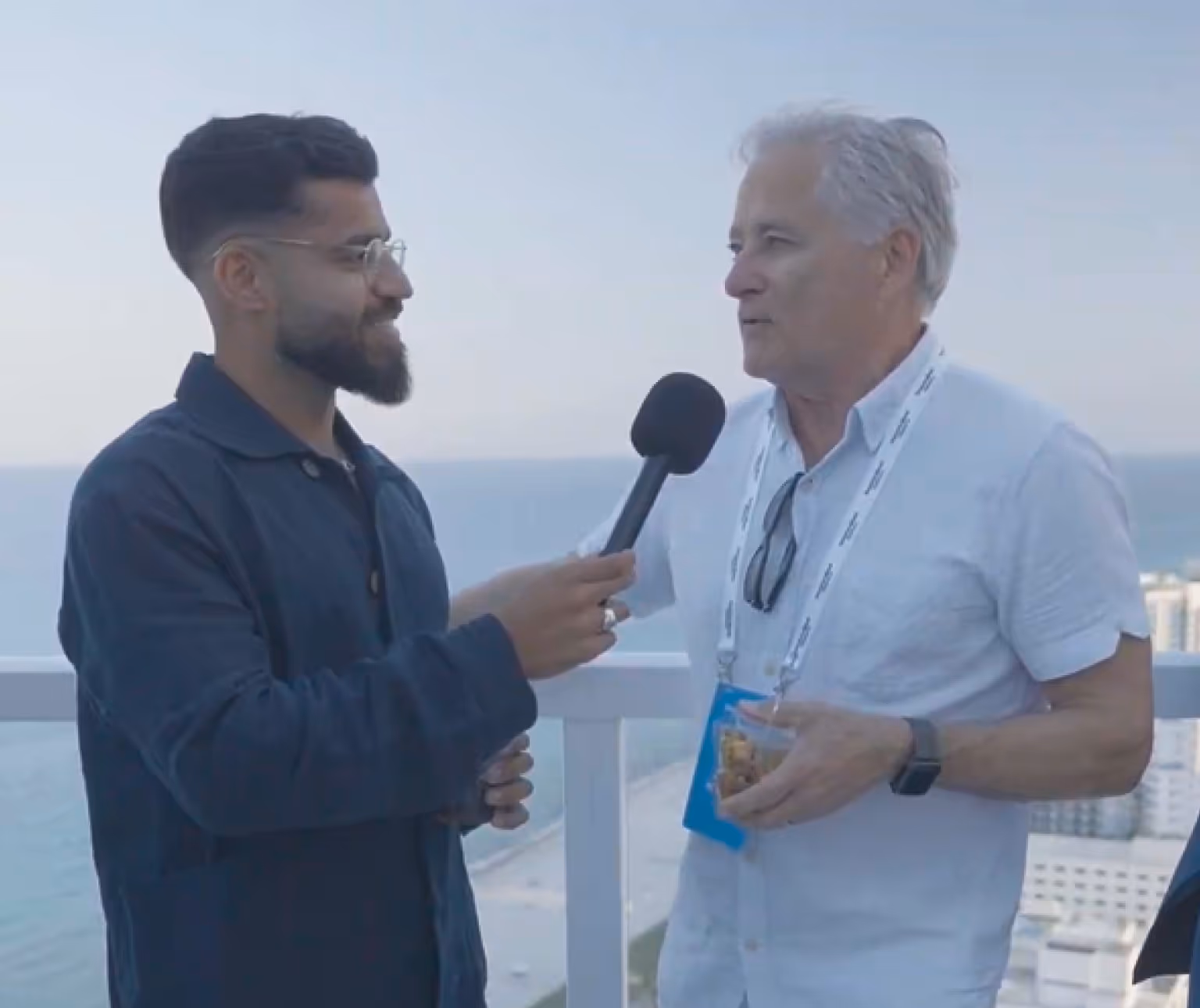 Allan sharing Decentralized Masters testimonial at Miami live event