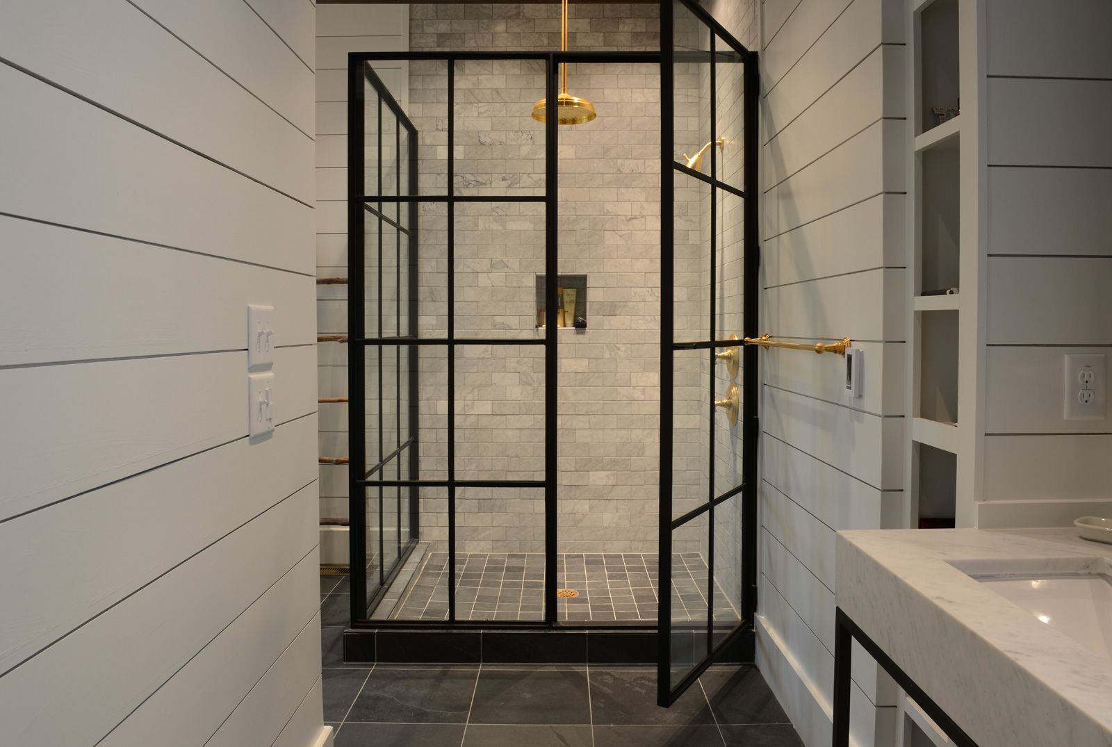 Stylish bathroom with black fixtures