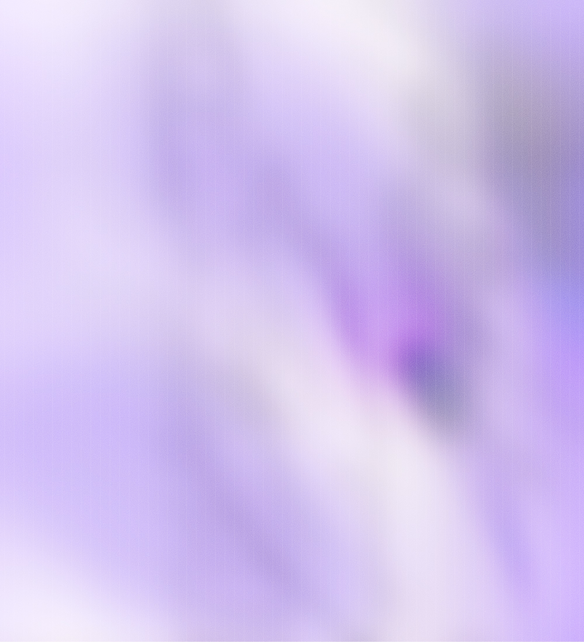 Soft, blurry background with various shades of purple and lavender tones.