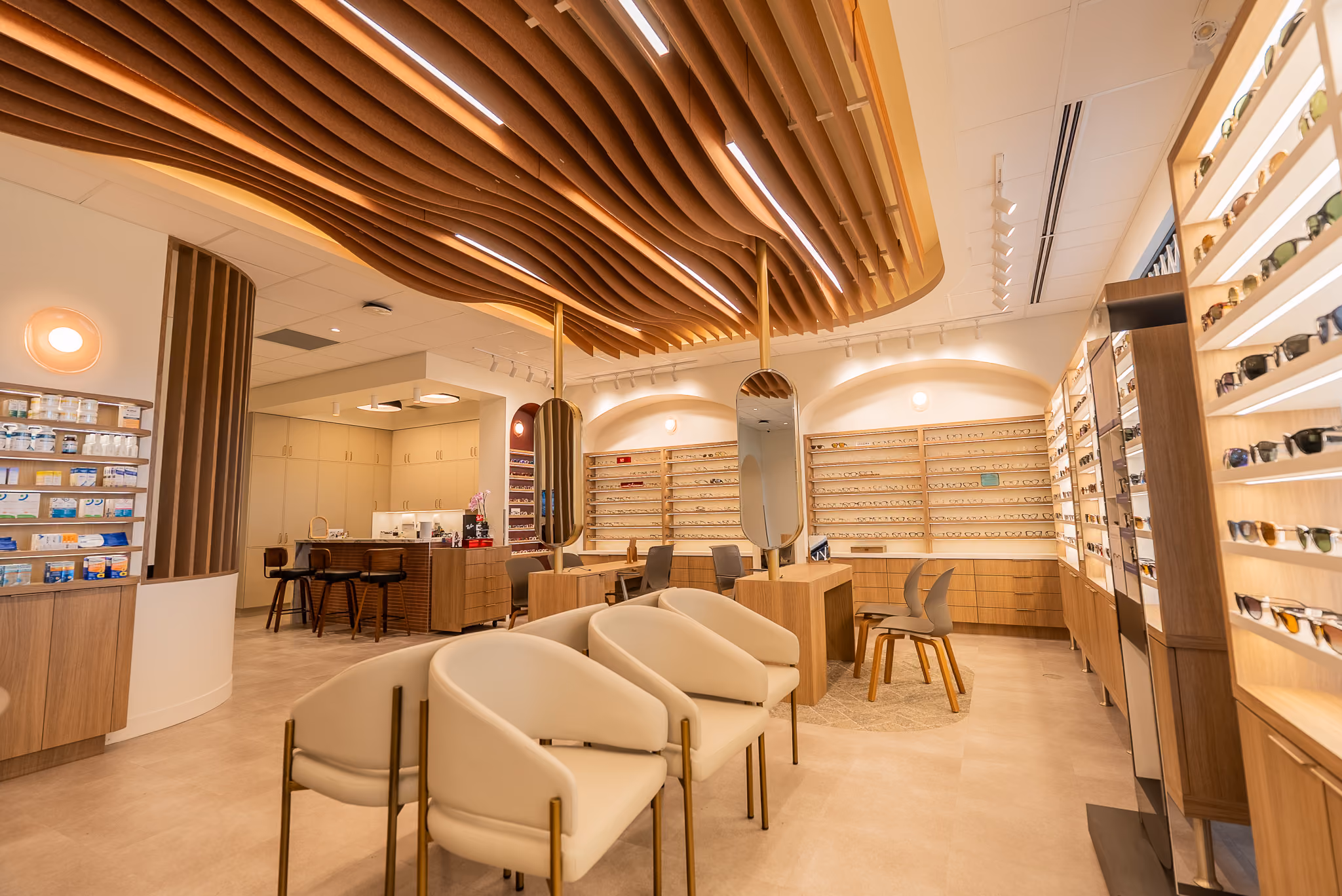 Bright, open interior of the Vision Care Woodward clinic with eyewear displays.