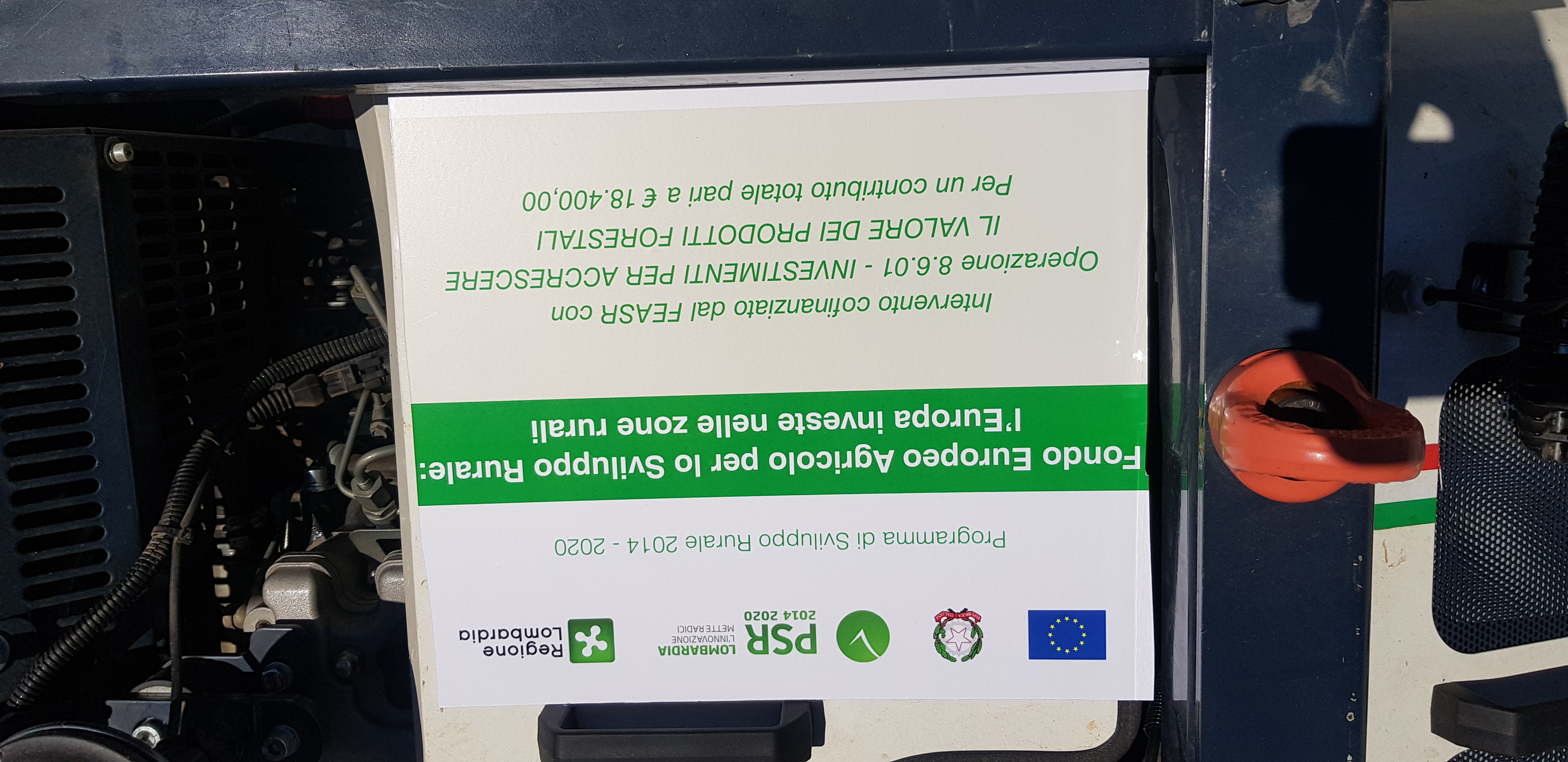 Sign about European Agricultural Fund investing in rural areas with funding details and logos.