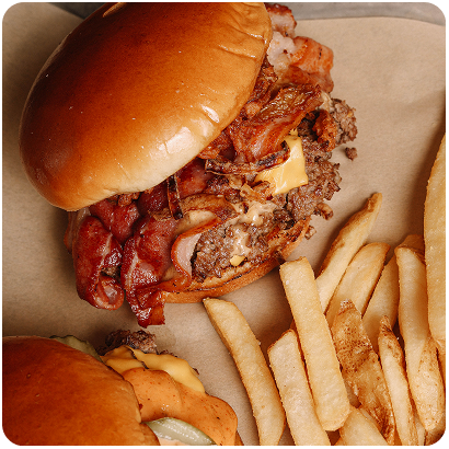 Buzz Bird smash burger with bacon and house-made sauce