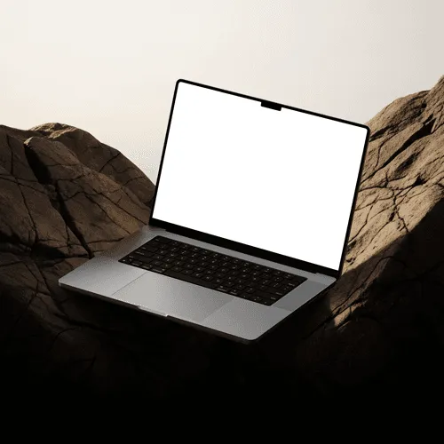 MacBook Pro mockup on rocky surface