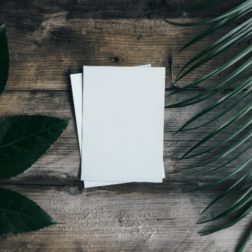 Paper On Wooden Surface Mockup