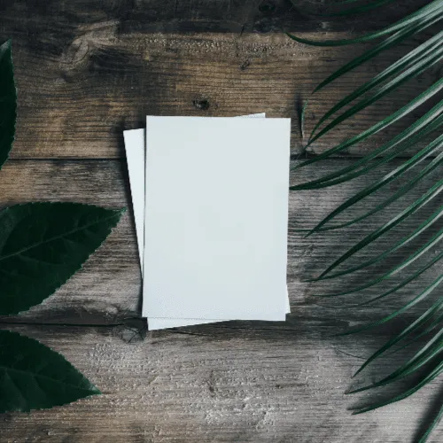Paper On Wooden Surface Mockup