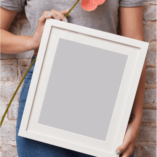 Woman Holding Frame Poster Mockup