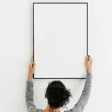 Hand Holding Poster Frame Mockup