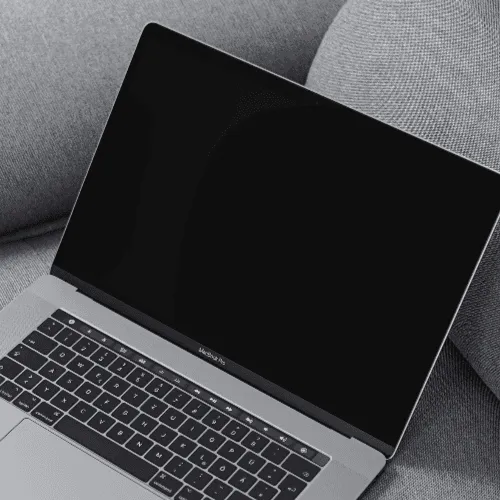 MacBook Pro Mockup on the couch