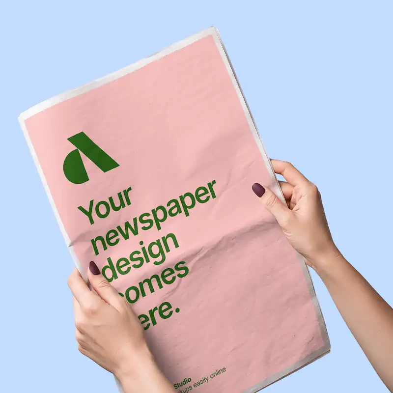 Hands Holding Newspaper Mockup