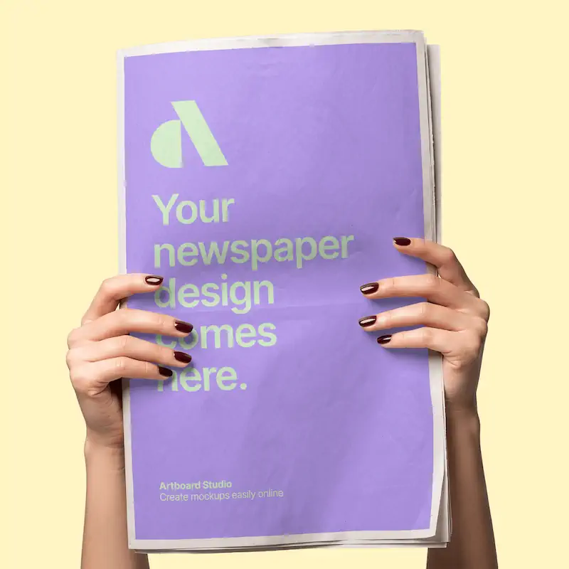 Female Hands Holding Newspaper Mockup