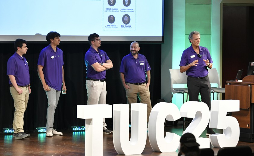 Ted and the Development Team on Stage of TUC 25