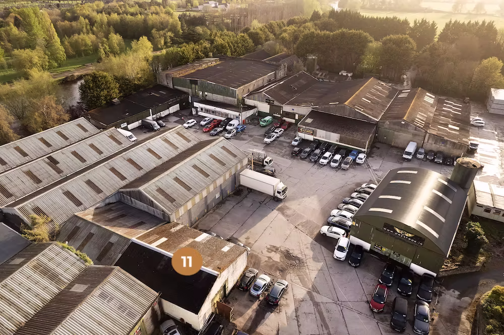 [background image] image of open office space (for a nonprofit & charity).