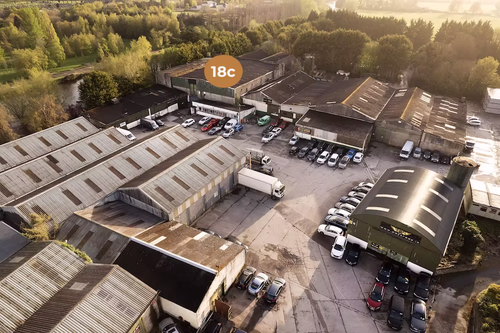 [background image] image of open office space (for a nonprofit & charity).