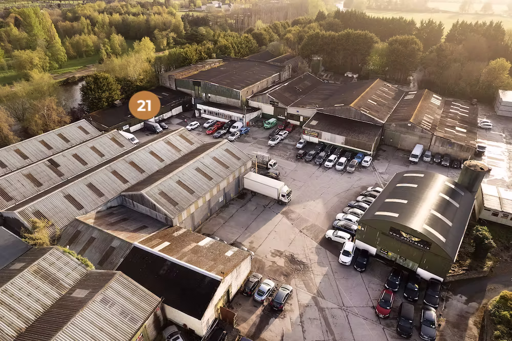 [background image] image of open office space (for a nonprofit & charity).