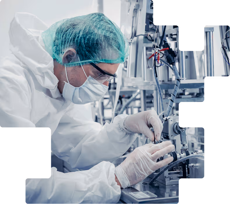 Cleanroom technician assembling medical device equipment