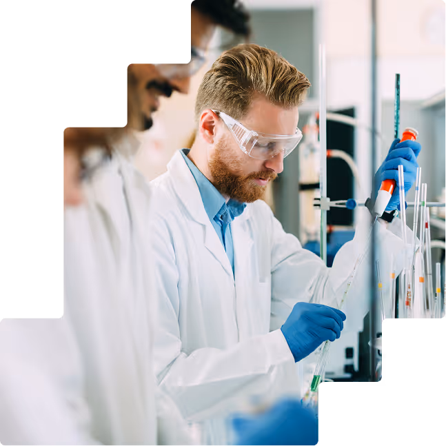 Male scientist pipetting samples at lab bench