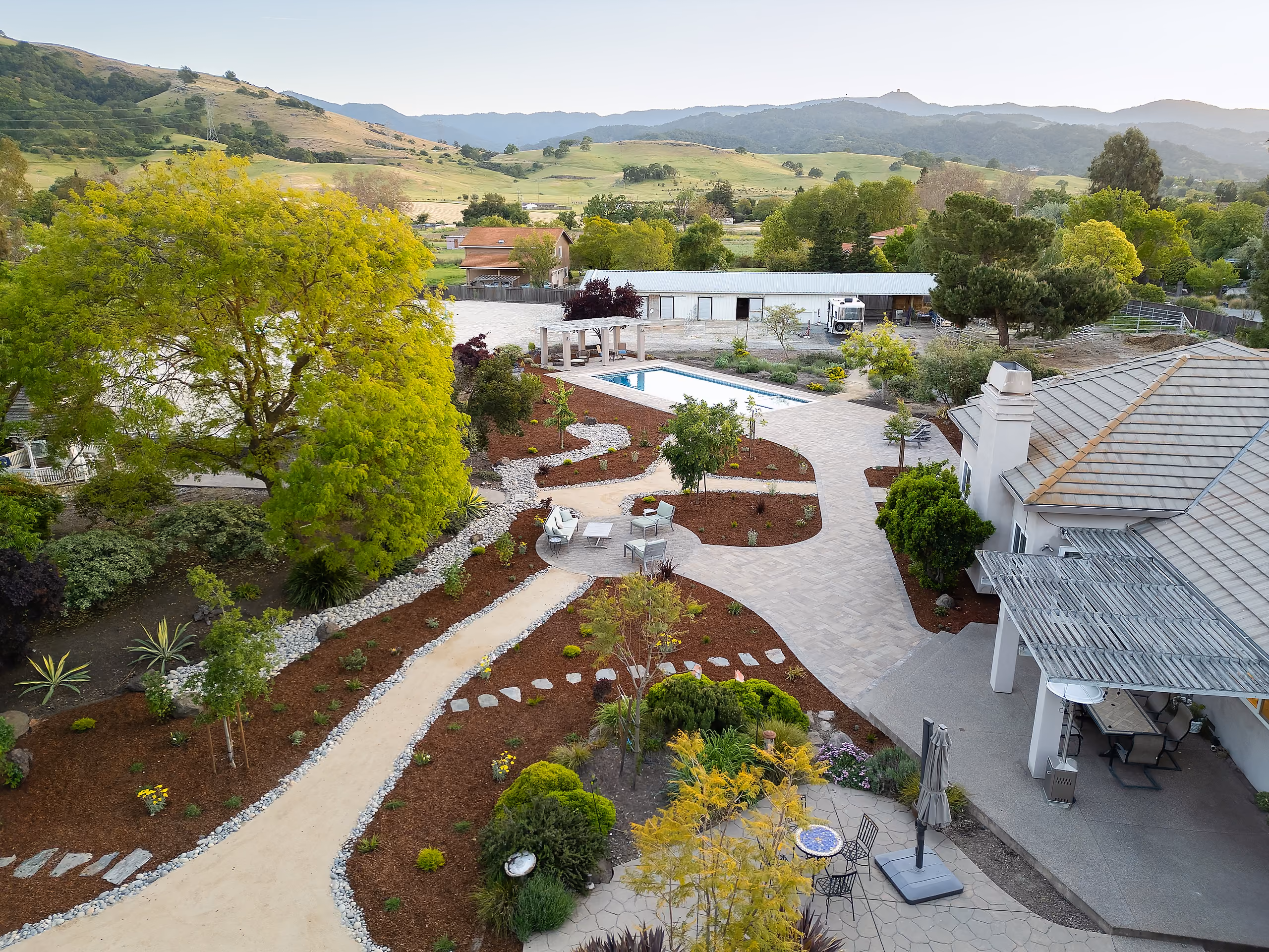Palo Alto estate landscape by Opulands with mature trees and open hillside views
