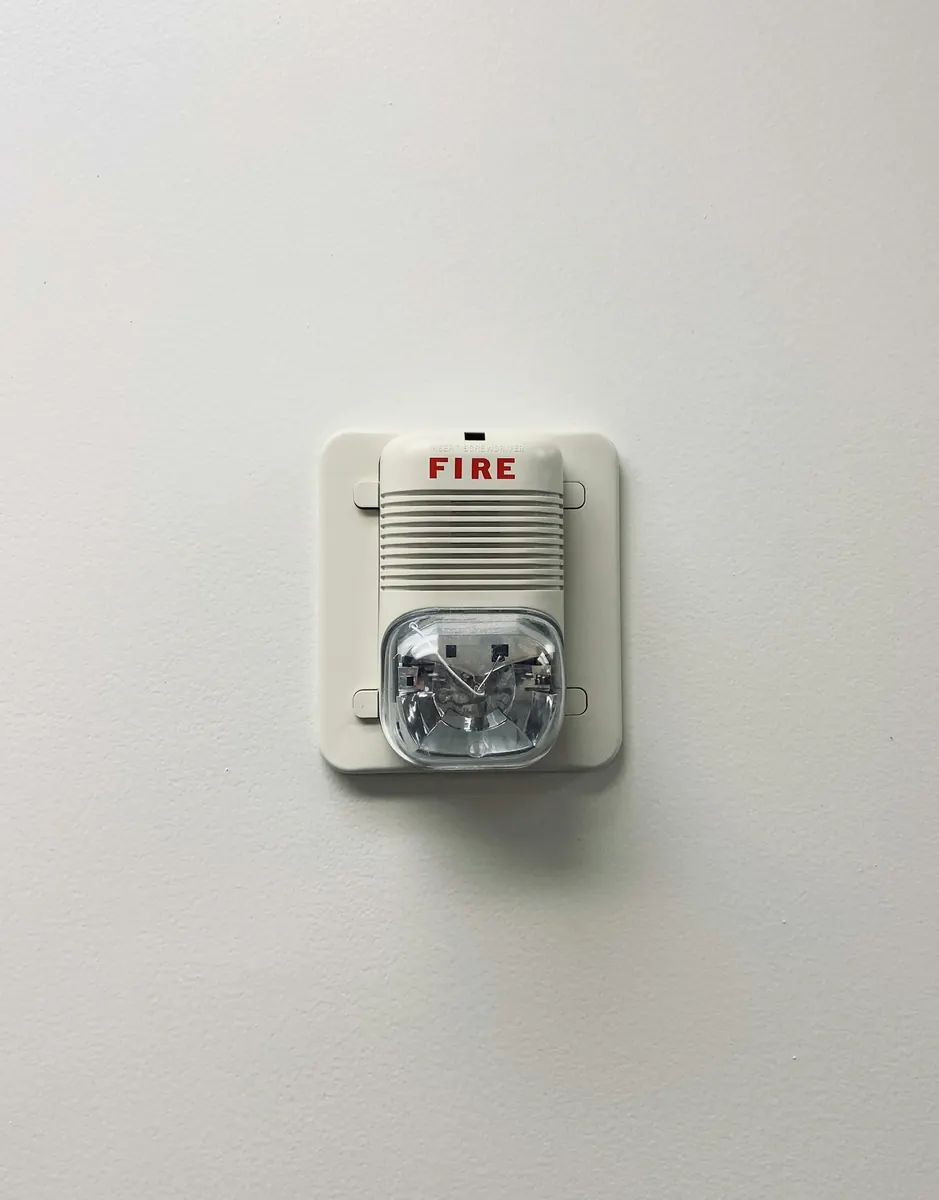 Smoke detector and carbon monoxide detector installed on residential ceiling