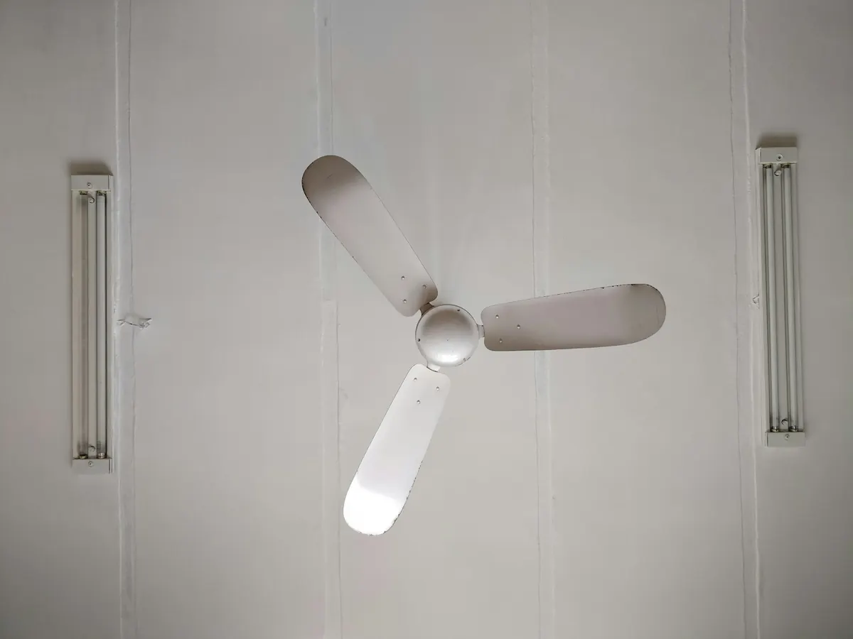 Ceiling fan professionally installed in a living room by Trapani Electric