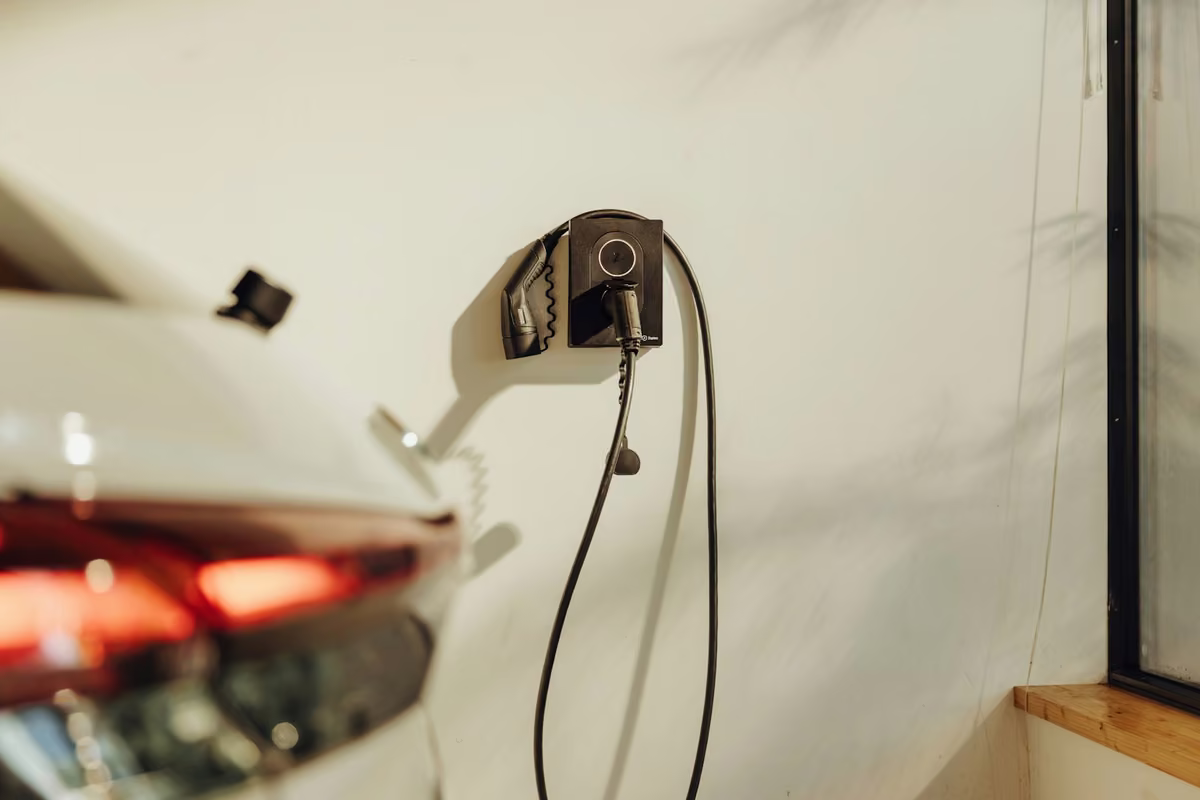 EV charger installed in a residential garage for home electric vehicle charging