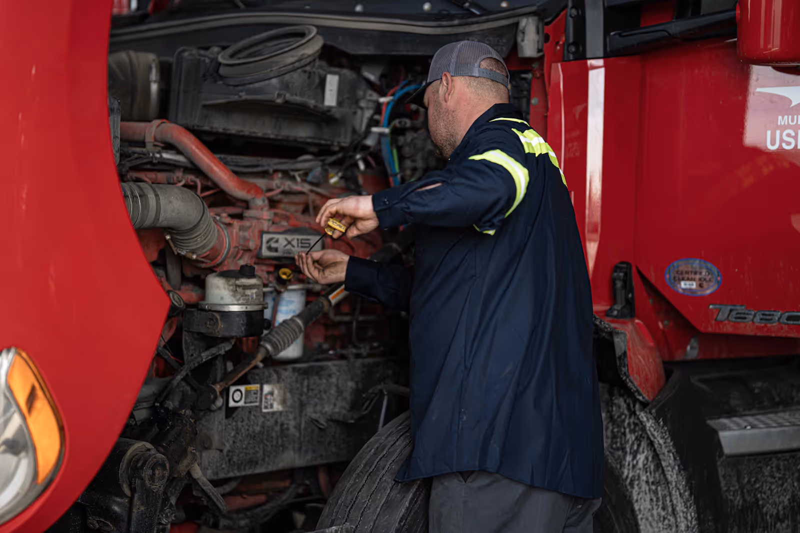 Mechanic performing truck preventive maintenance in Tracy, CA