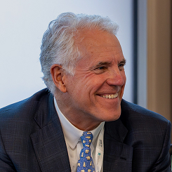 Portrait of Chris Coburn, Chief Innovation Officer at Mass General Brigham (MGB).