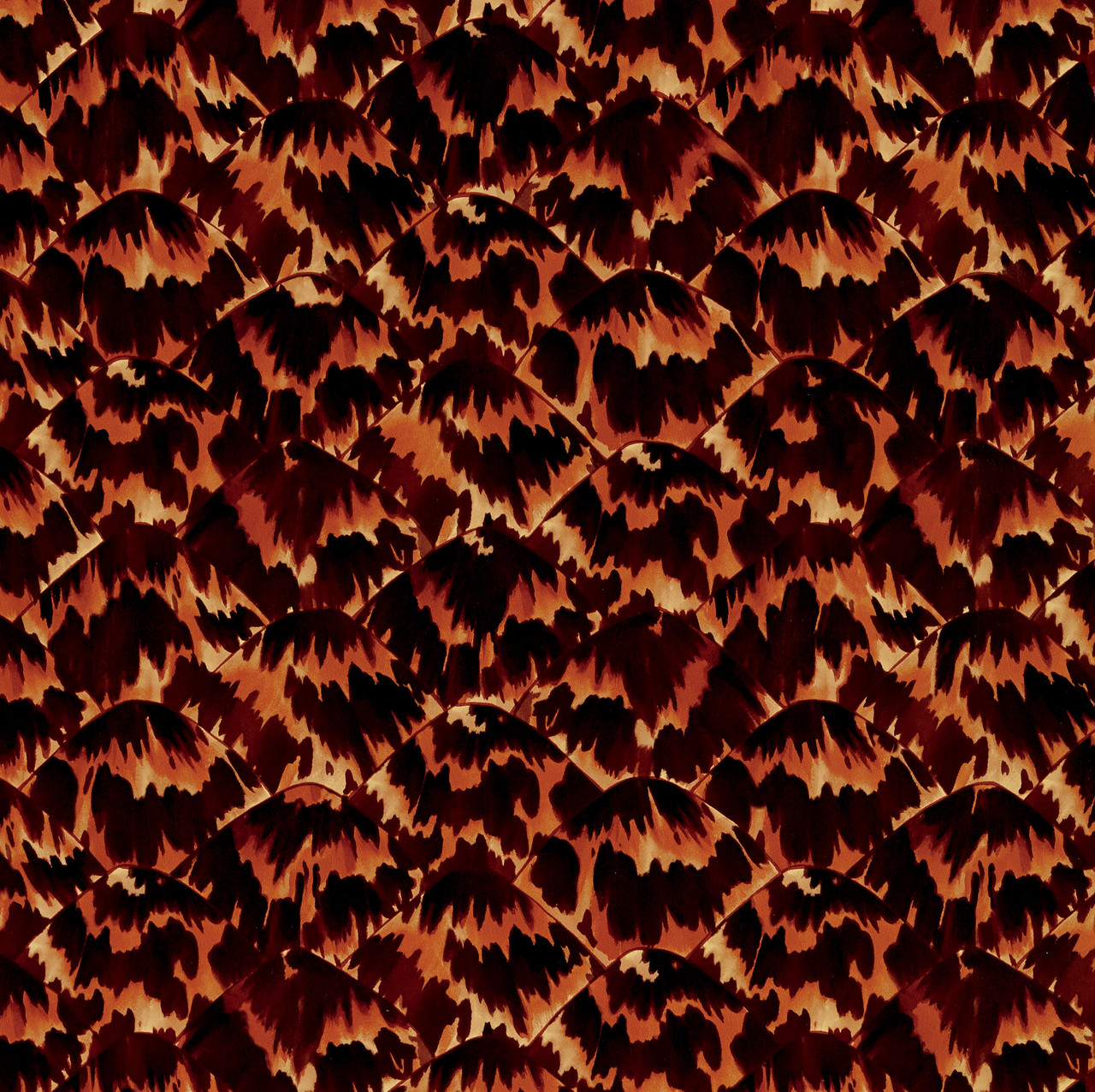Glossy tortoiseshell pattern in amber, caramel and espresso.