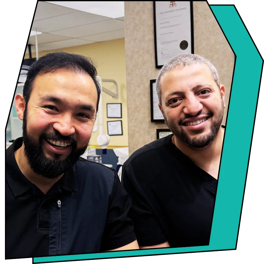 Dr. James Farozi and Dr. Mohamed Mousa smiling.