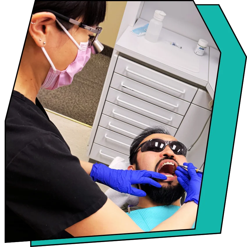 Patient having their teeth cleaned.