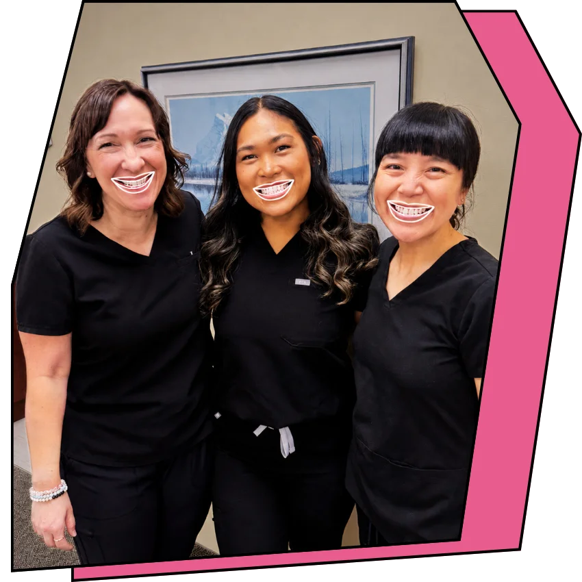 Three hygienists smiling.