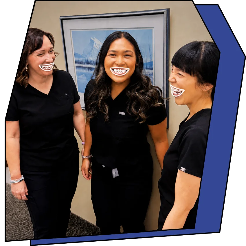Three hygienists laughing together